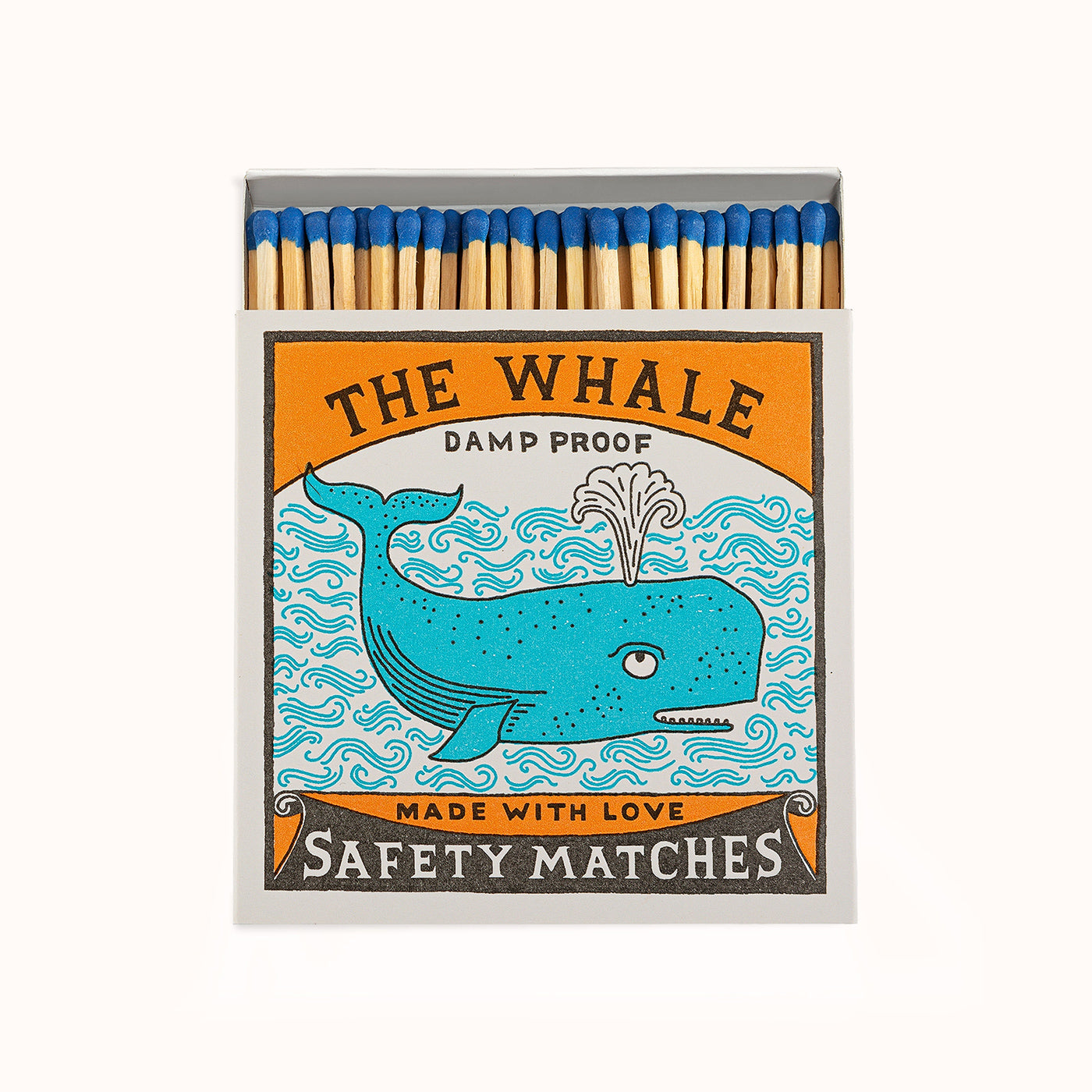 Matches in a decorative Archivist Gallery matchbox featuring a blue whale, set against a black background, available at Wildschut Antiques.