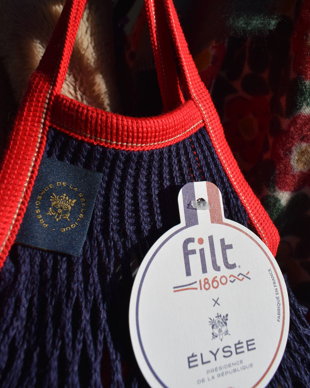 Navy bag with red handle and Filt 1860 brand tag featuring. Available at Wildschut Antiques.