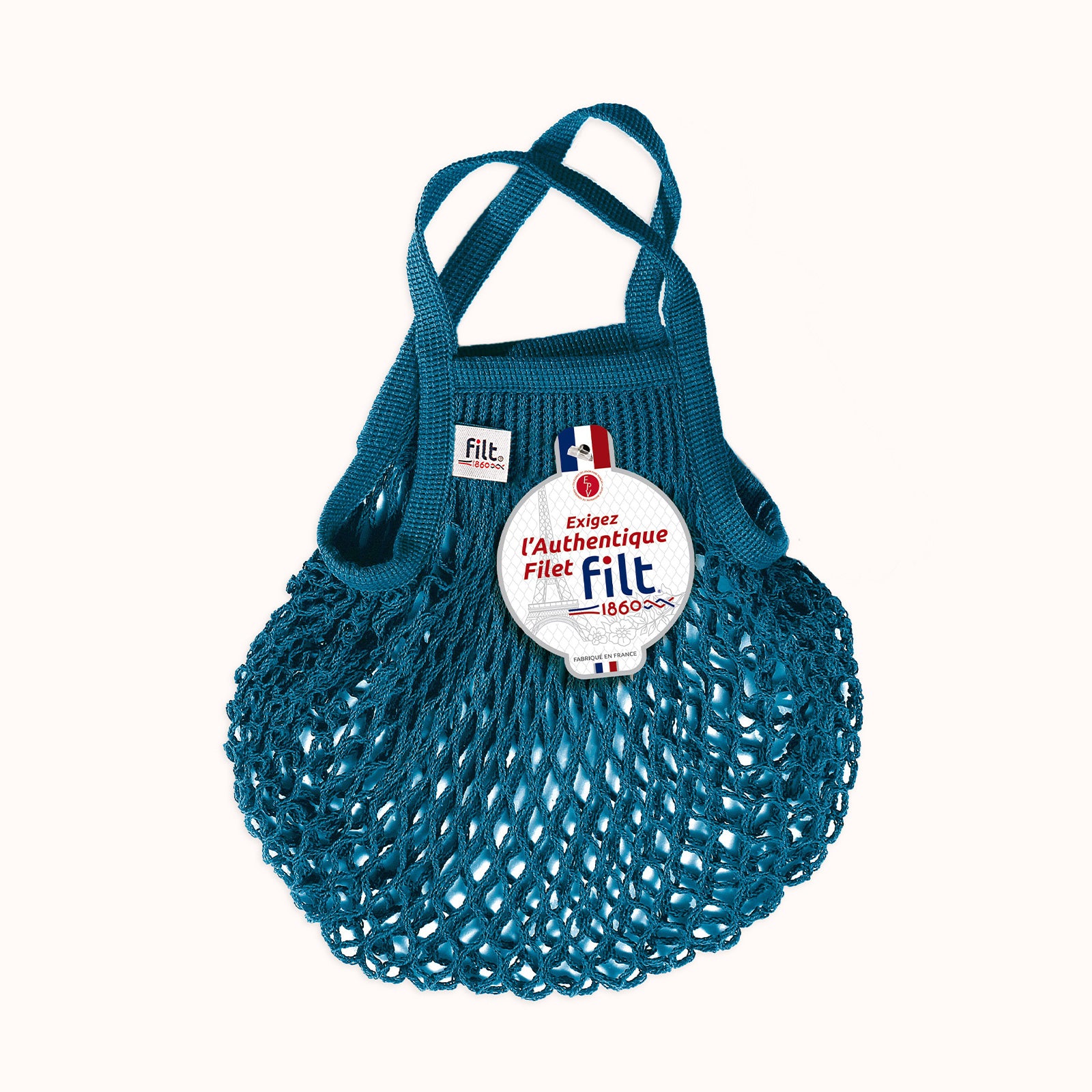 Blue mesh bag with 'Filt 1860' branding on a white background, available at Wildschut Antiques