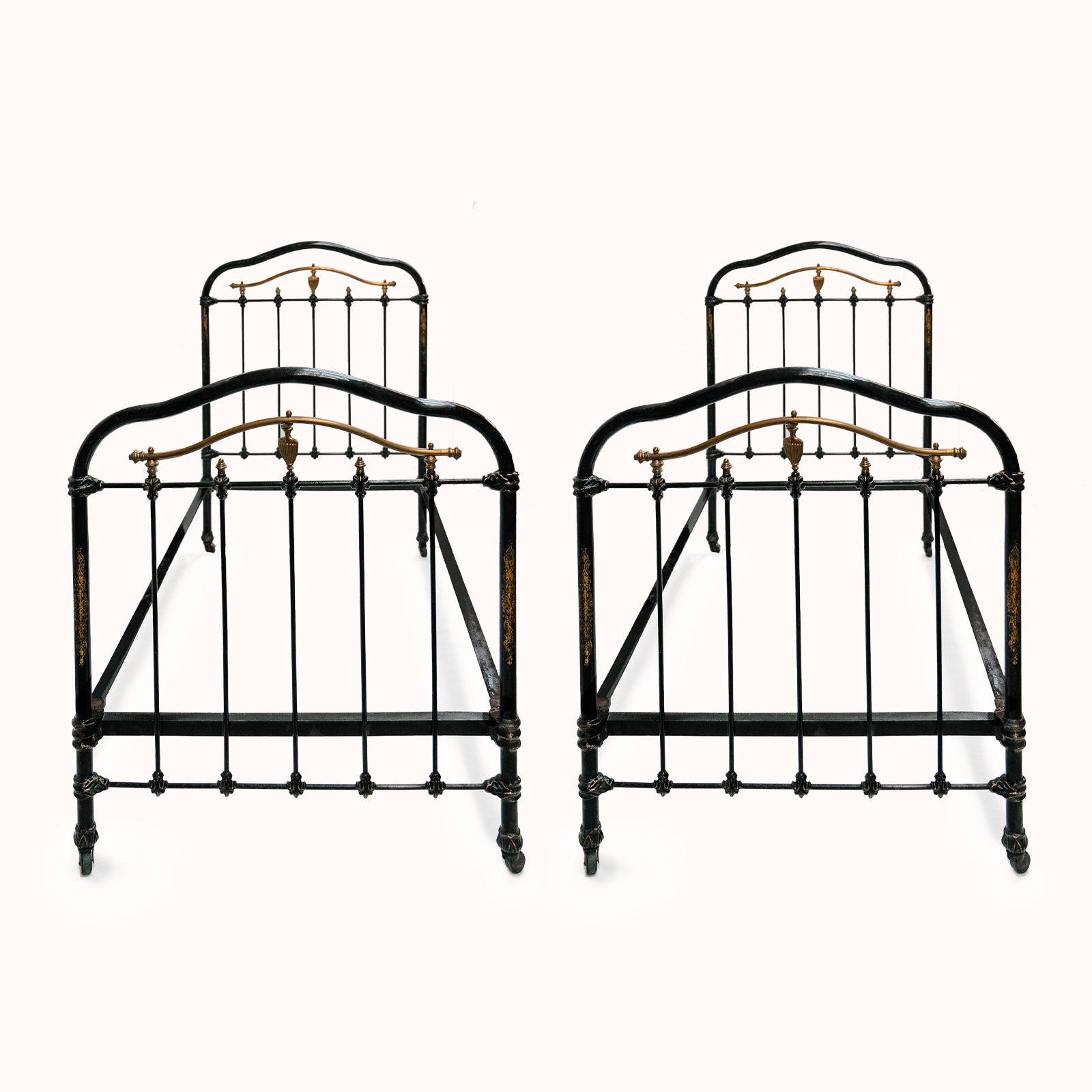 Matching Pair of Antique Cast Iron Antique Single Beds in Black and Gold