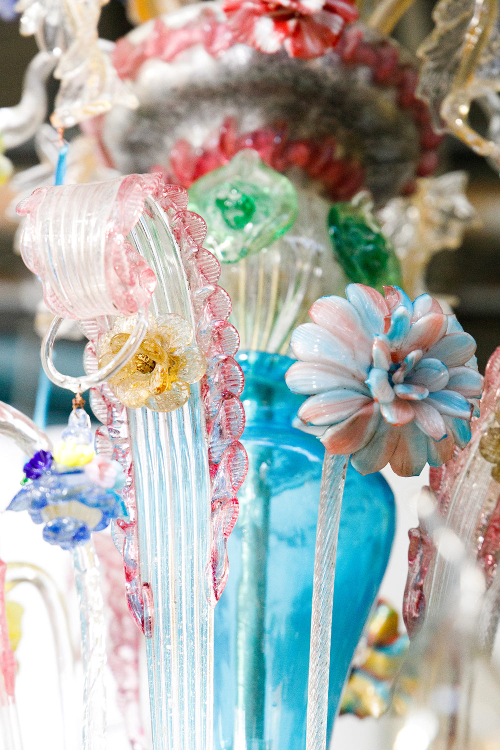 Colorful glass flower arrangement with decorative elements, belonging to a colorful vintage Venetian Murano Glass chandelier, available via Wildschut Antiques