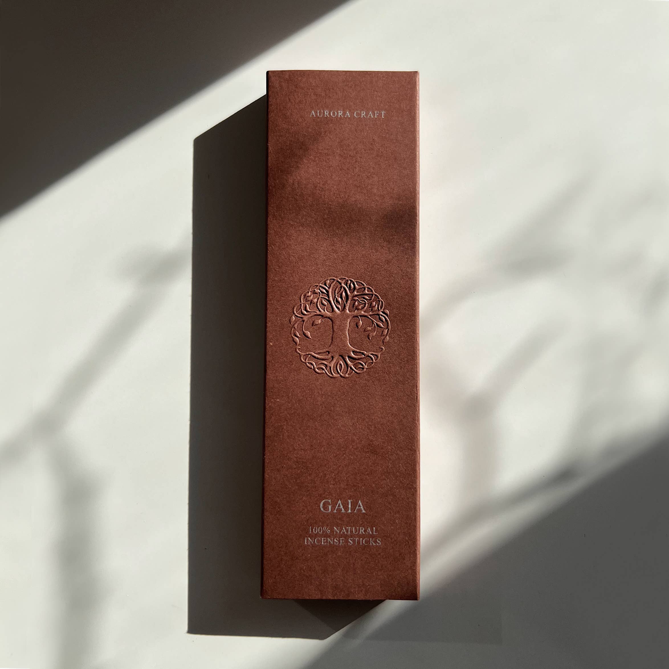 Brown incense stick box with 'GAIA' branding on a light background, available via Wildschut Antiques Homeware