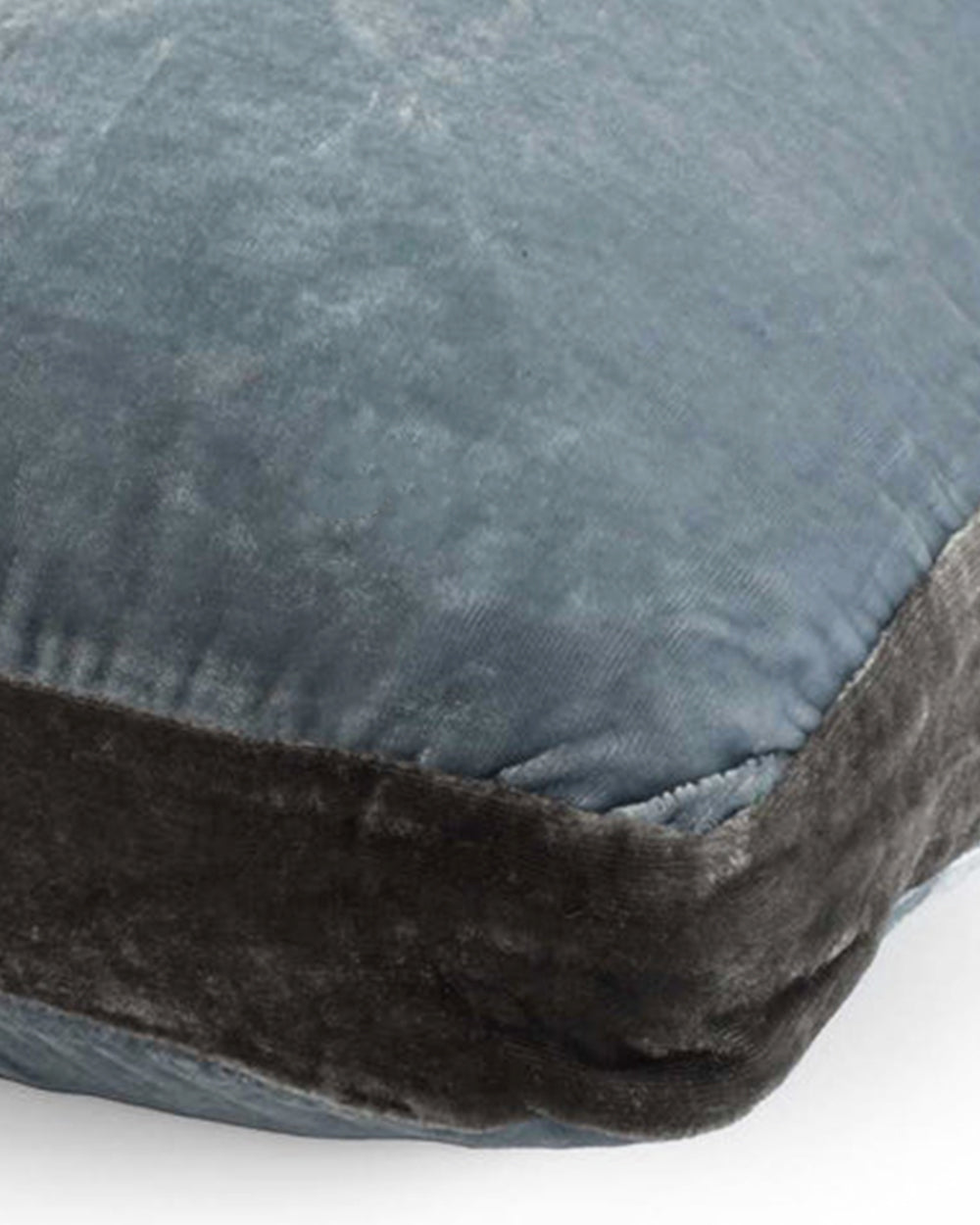 Close-up of a silk velvet velour grey ice blue cushion with a contrasting dark grey border on a white background. Model James, designed by Monde Sauvage Paris, available at Wildschut Antiques.