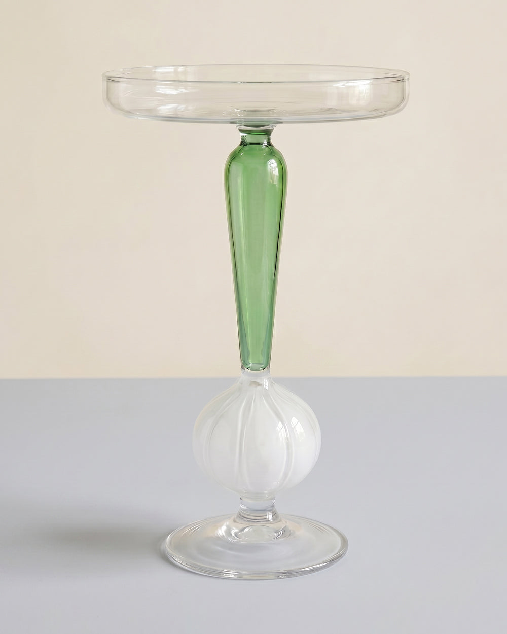 Glass spring onion platter by Ichendorf Milano, featuring a playful botanical design, available at Wildschut Antiques.